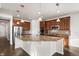Well-equipped kitchen with granite counters, stainless steel appliances, and ample cabinet space at 3654 Paintbrush Ln, Parker, CO 80138
