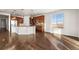 Bright kitchen with stainless steel appliances, wooden cabinets and scenic view at 3654 Paintbrush Ln, Parker, CO 80138