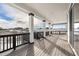 Covered porch featuring white columns and black railings with great scenic views at 3654 Paintbrush Ln, Parker, CO 80138