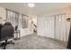 Finished basement offers carpeted floors and a bonus entertainment area at 4912 Altura St, Denver, CO 80239