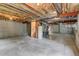 Unfinished basement with mechanicals, and stairs offers potential for customization at 6735 W 97Th Cir, Westminster, CO 80021
