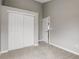 Bedroom with carpet and large closet provides ample storage space at 6735 W 97Th Cir, Westminster, CO 80021