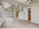 Bright and spacious living room with high ceilings, large windows, and new floors at 6735 W 97Th Cir, Westminster, CO 80021