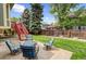 Outdoor patio area surrounded by green space, perfect for entertaining at 6735 W 97Th Cir, Westminster, CO 80021