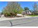 Inviting exterior with mature trees, a well-kept lawn, and a cozy home, featuring a charming wooden fence at 12978 Dexter St, Thornton, CO 80241