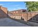 Fenced backyard with a concrete patio and some plants at 125 S 22Nd Ave # 6, Brighton, CO 80601