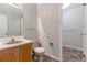 Neutral-toned bathroom featuring a single sink vanity and tile flooring at 125 S 22Nd Ave # 6, Brighton, CO 80601