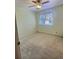 Standard carpeted bedroom featuring neutral carpeting, window with blinds and overhead ceiling fan with lighting at 10553 Adams St, Northglenn, CO 80233