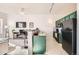 Open kitchen and living area in a bright and spacious floorplan at 15475 Andrews Dr # 318, Denver, CO 80239