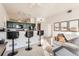 Bright living area featuring breakfast bar and seating at 15475 Andrews Dr # 318, Denver, CO 80239