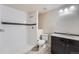 Practical bathroom featuring a walk-in shower and a vanity with granite countertops at 6634 S Patsburg St, Aurora, CO 80016