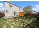 Spacious backyard has privacy fence, wooden privacy screen, patio, and potential for gardening and outdoor activities at 11570 Depew Ct, Westminster, CO 80020