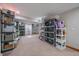 Finished basement providing ample storage space with shelving and organized containers at 11570 Depew Ct, Westminster, CO 80020
