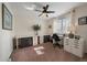 Spacious home office featuring organized desk space, cabinets, and plenty of room for productivity at 11570 Depew Ct, Westminster, CO 80020