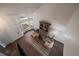 Bright living room with large windows, vaulted ceilings, and a cozy seating area with stylish decor at 11570 Depew Ct, Westminster, CO 80020