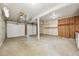 Spacious two car garage with ample storage space and unfinished walls at 7862 W 84Th Ct, Arvada, CO 80005