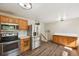 Updated kitchen features stainless steel appliances and quartz countertops, perfect for cooking and entertaining at 7862 W 84Th Ct, Arvada, CO 80005