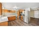 This open kitchen boasts stainless steel appliances, light cabinets and a functional design for Gathering meals at 7862 W 84Th Ct, Arvada, CO 80005