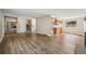 Open living room featuring an open layout, hardwood floors and staircase at 7862 W 84Th Ct, Arvada, CO 80005