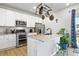 Well-appointed kitchen with stainless steel appliances, granite countertops, and ample storage at 27125 E Bayaud Ave, Aurora, CO 80018