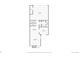 First floor layout featuring a living room, kitchen, dining room, and garage at 7707 S Curtice Way # D, Littleton, CO 80120