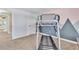 Home gym featuring workout equipment and serene mountain design on the walls at 7707 S Curtice Way # D, Littleton, CO 80120