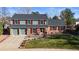 Two-story house with attached two-car garage at 5162 S Holland St, Littleton, CO 80123