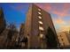 Penn Towers Condominiums is a brick apartment building with multiple stories and well-maintained grounds at 1045 N Pennsylvania St # 303, Denver, CO 80203