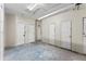 Open basement area features multiple storage rooms for tenant's use, offering ample space and organization at 1356 N Pearl St # 109, Denver, CO 80203