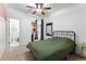 Bright bedroom with carpeted floor, ceiling fan, and a private space perfect for a home office at 1356 N Pearl St # 109, Denver, CO 80203