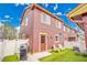 Backyard featuring artificial turf, a grill, outdoor seating, and a fenced-in area at 600 Avalon Ave, Lafayette, CO 80026