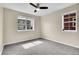 Bedroom with carpet, closet and natural lighting from two windows at 600 Avalon Ave, Lafayette, CO 80026