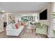 Spacious living room with modern design, open layout, and seamless flow to the kitchen at 600 Avalon Ave, Lafayette, CO 80026