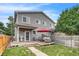 Spacious backyard showing the deck, fenced yard, and the home's exterior at 3937 Osceola St, Denver, CO 80212