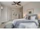 Bright bedroom with a ceiling fan and plenty of natural light at 3937 Osceola St, Denver, CO 80212