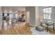 Open floor plan with hardwood floors, modern furnishings, and lots of natural light at 3937 Osceola St, Denver, CO 80212