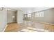 Spacious living room with hardwood floors offers ample space for entertaining and relaxation at 2572 S Vine St, Denver, CO 80210
