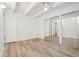Bedroom with wood-look floors and sliding mirrored closet doors at 250 N Pearl St # 310, Denver, CO 80203