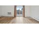 Living room view with hardwood floors and patio access at 250 N Pearl St # 310, Denver, CO 80203
