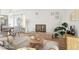 Inviting living room featuring a brick fireplace, light wood floors, and ample natural light at 250 N Pearl St # 310, Denver, CO 80203