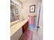 Bathroom with a functional layout, vanity with storage, and a shower-tub combination at 6899 Countryside Ln # 269, Niwot, CO 80503
