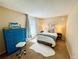 Bright bedroom with a comfortable bed, blue dresser, and lots of natural light at 6899 Countryside Ln # 269, Niwot, CO 80503