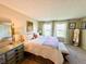 Bedroom with a neutral palette, complemented by abundant natural light and a cozy ambiance at 6899 Countryside Ln # 269, Niwot, CO 80503