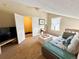 Multi-purpose bonus room offering comfortable seating, natural light, and potential for various uses at 6899 Countryside Ln # 269, Niwot, CO 80503