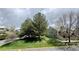 Well-maintained home exterior with mature trees and landscaping, offering curb appeal and a welcoming atmosphere at 6899 Countryside Ln # 269, Niwot, CO 80503