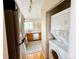 Charming kitchen with stainless steel refrigerator, washer/dryer closet, and bright natural light at 6899 Countryside Ln # 269, Niwot, CO 80503