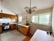 Charming kitchen featuring oak cabinetry, stainless steel appliances, and ample natural light at 6899 Countryside Ln # 269, Niwot, CO 80503