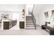 Finished basement features a beverage center, wet bar and staircase at 1466 S Gaylord St, Denver, CO 80210