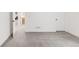 Clean, empty room with carpeted floors, two doors and one vent, ready for your personal touch at 1466 S Gaylord St, Denver, CO 80210