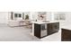 Open living room boasts modern design, bar with wine fridge, and comfortable seating area, perfect for entertaining and relaxation at 1466 S Gaylord St, Denver, CO 80210